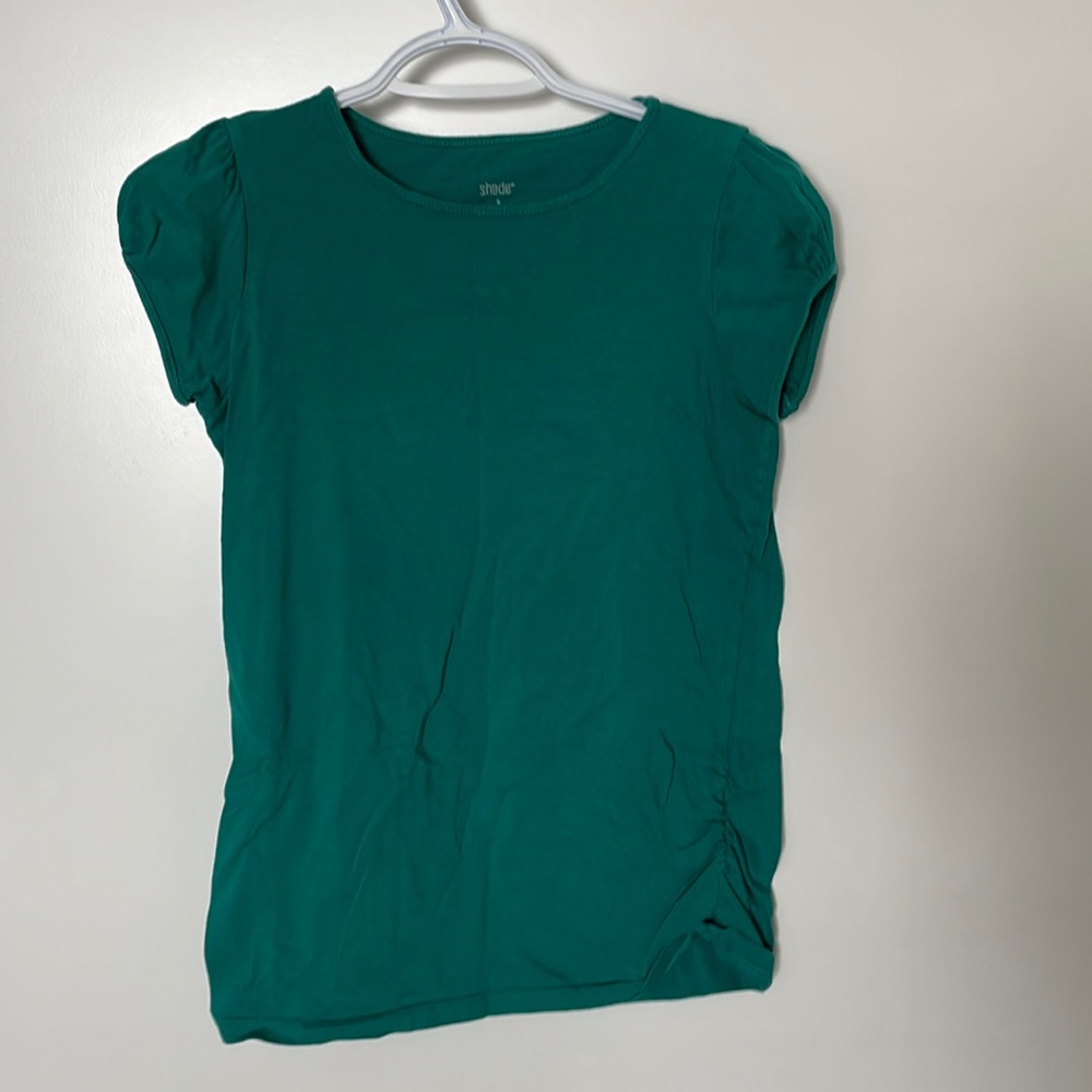 Blue green Shade shirt. Has sleeve and side details